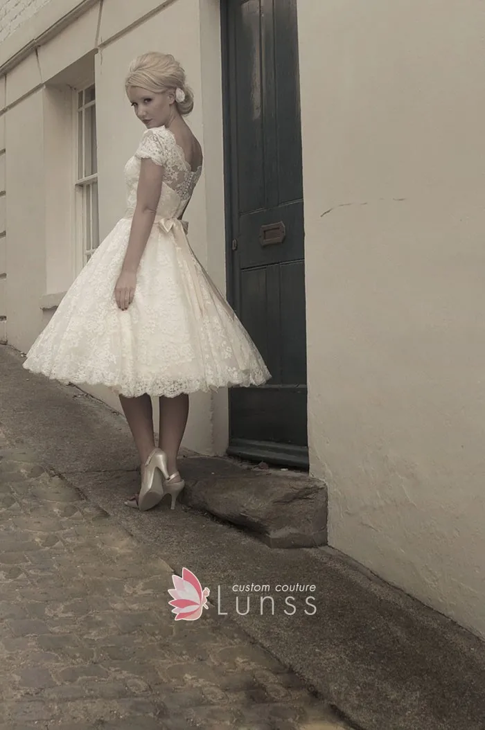 illusion bateau neckline with scalloped lace edging short bridal dress