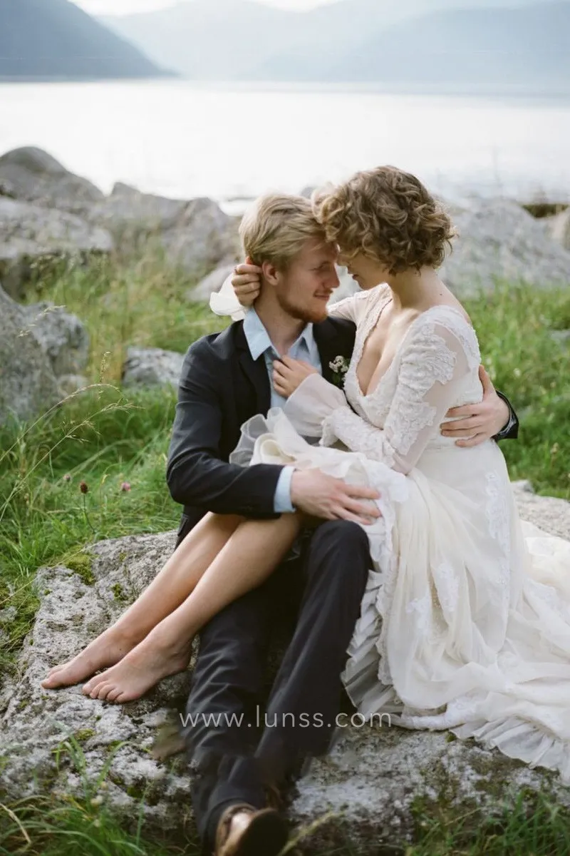ivory lace ruffled sleeve wedding dress