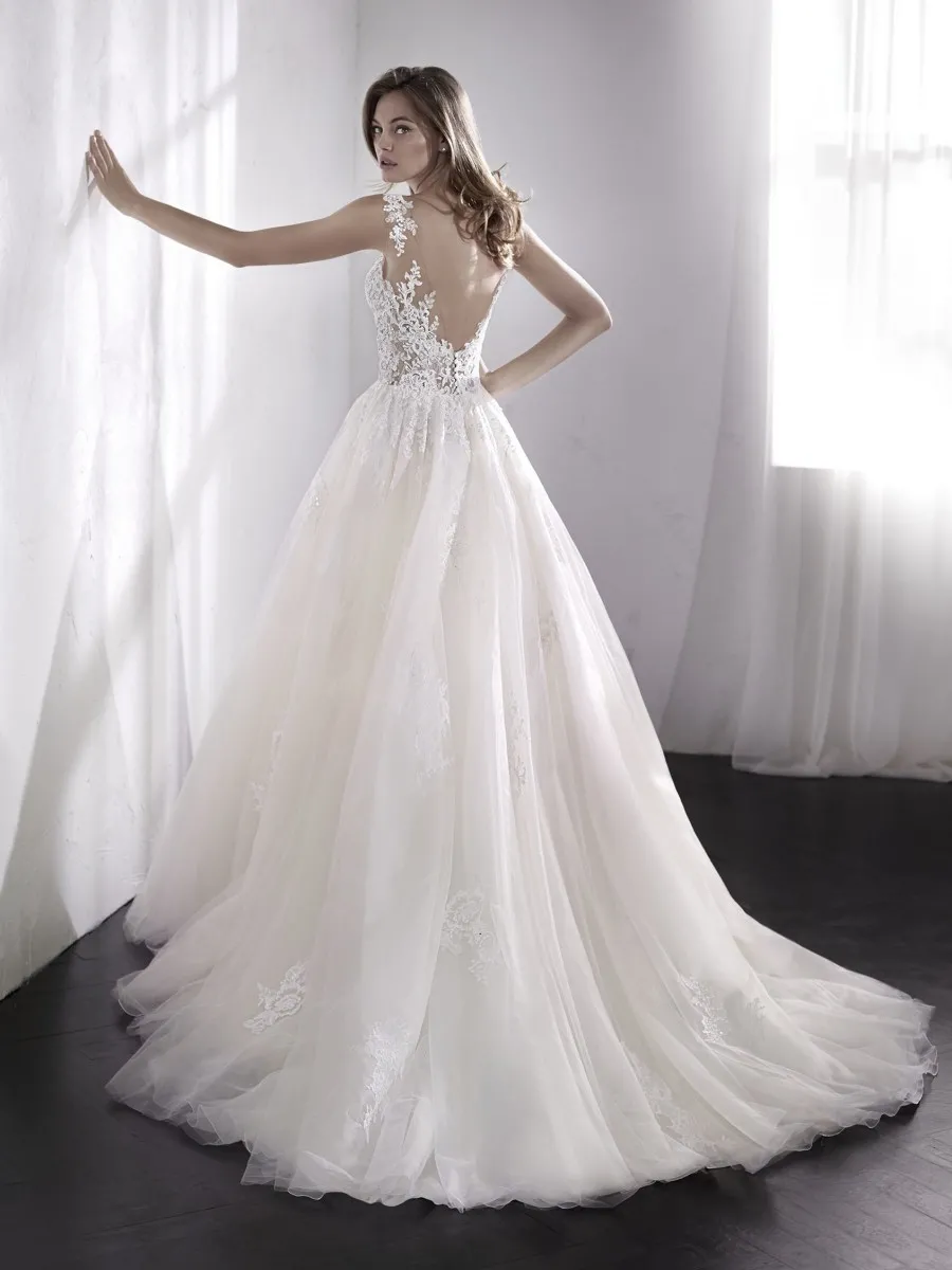 sleeveless ivory lace low back long wedding dress with court train