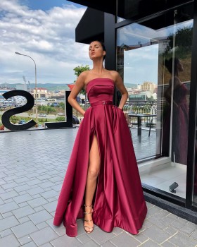 strapless sleek wine satin slit prom dress with pockets