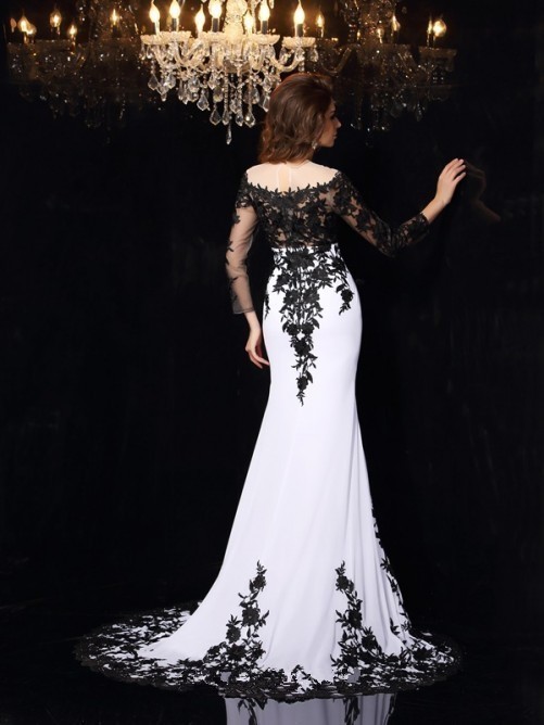 white spandex mermaid prom dress with black lace appliques