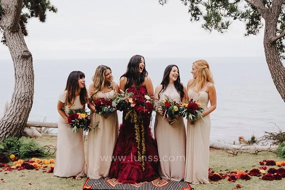 destination outdoor wedding with a burgundy bridal gown