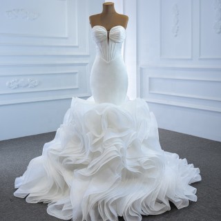flanged ivory organza trumpet wedding gown