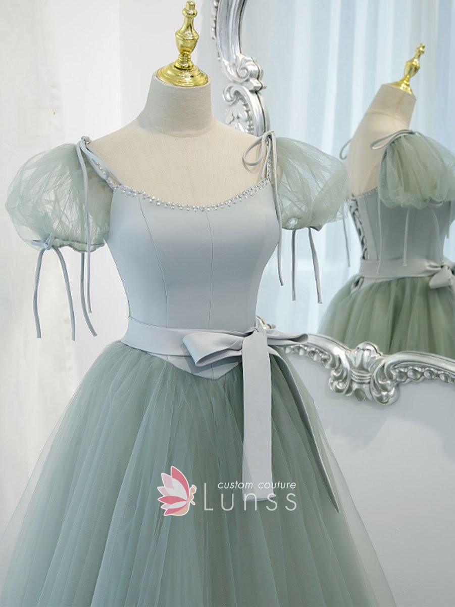 satin bodice with beaded scoop neckline and basque waist