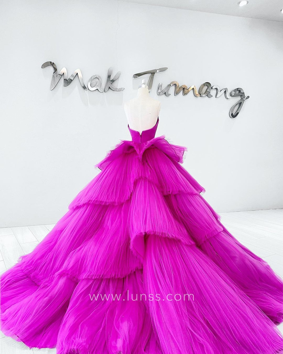 beaded pleated tiered fuchsia ball gown