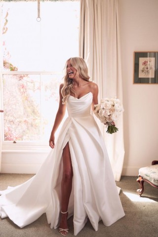 dramatic ivory billowing draped satin slit wedding dress