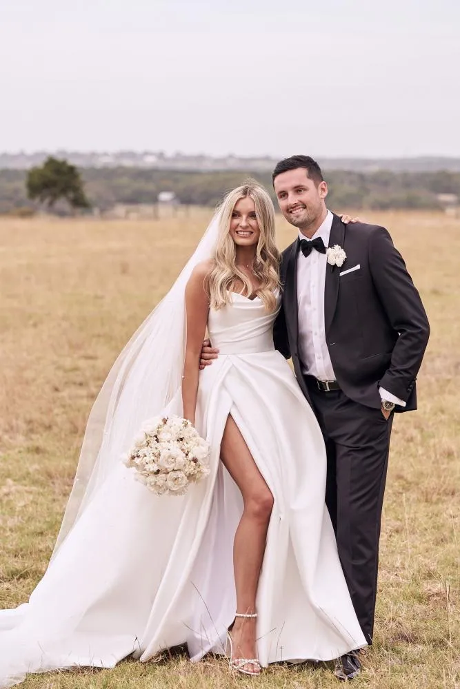 ivory white satin wedding dress with pearl veil