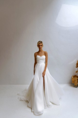 simply elegant white organza strapless slit wedding dress