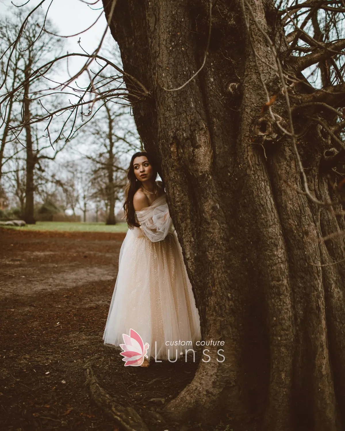 dotted cream tulle bridal dress with sheer long sleeves dotted cream tulle bridal dress with sheer long sleeves