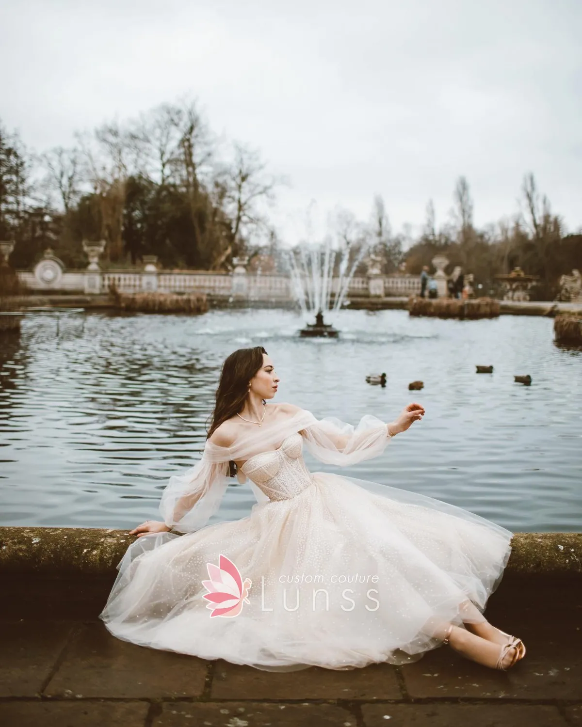 dotted cream tulle princess bridal dress with off the shoulder sheer long sleeves dotted cream tulle princess bridal dress with off the shoulder sheer long sleeves