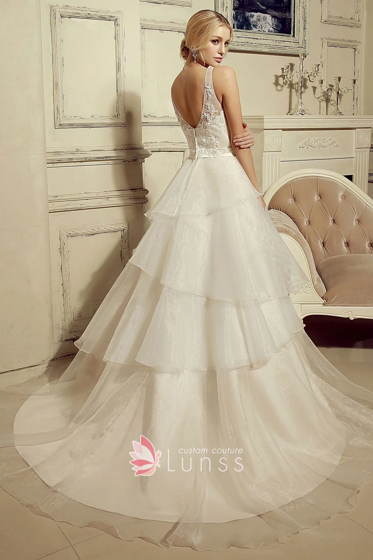 ivory tiered organza wedding gown