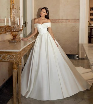 sleek shiny ivory satin off the shoulder wedding gown