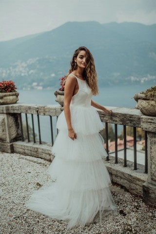ivory tiered tulle sleevless long bohemian wedding dress