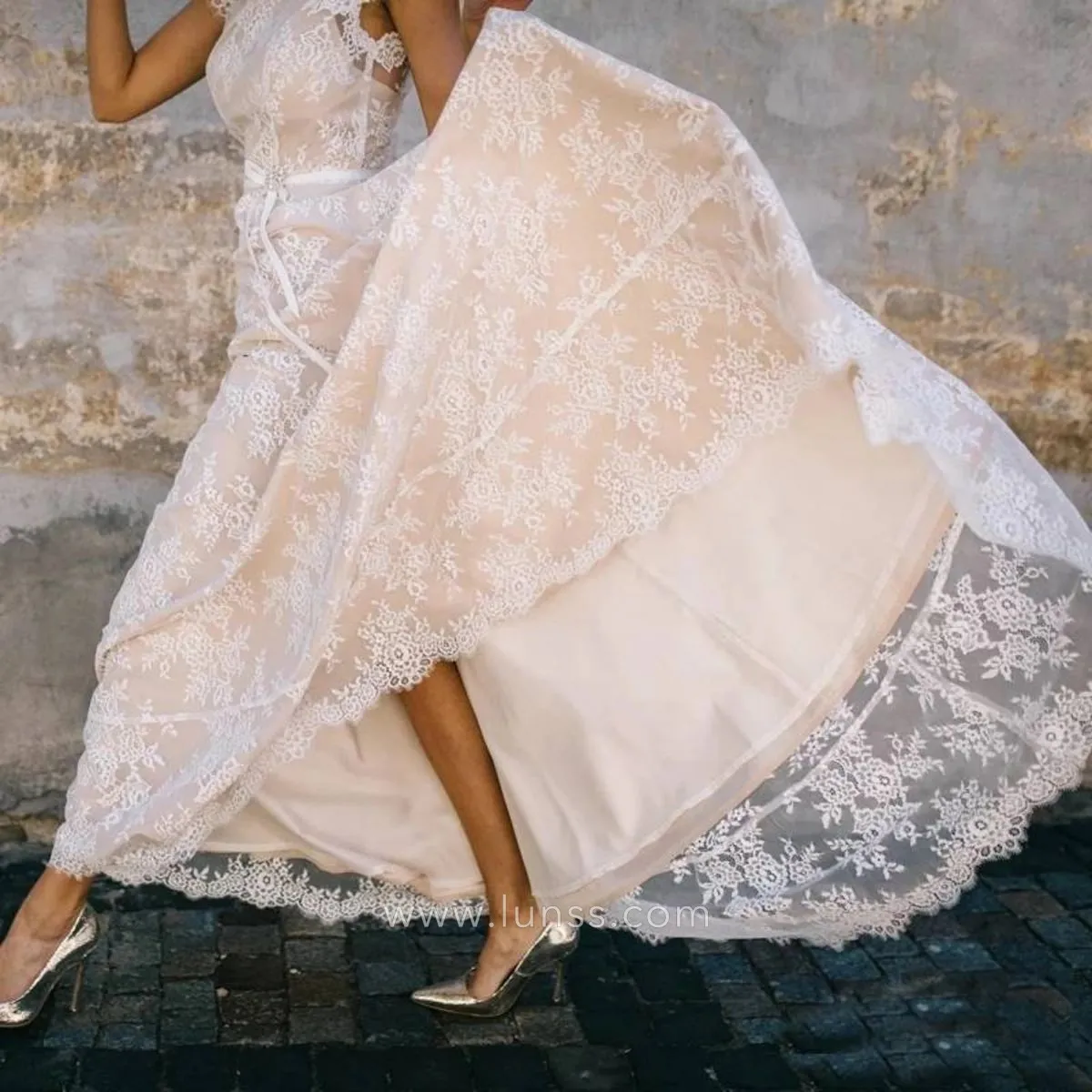 ivory lace nude pink lining a line floor length bridal dress