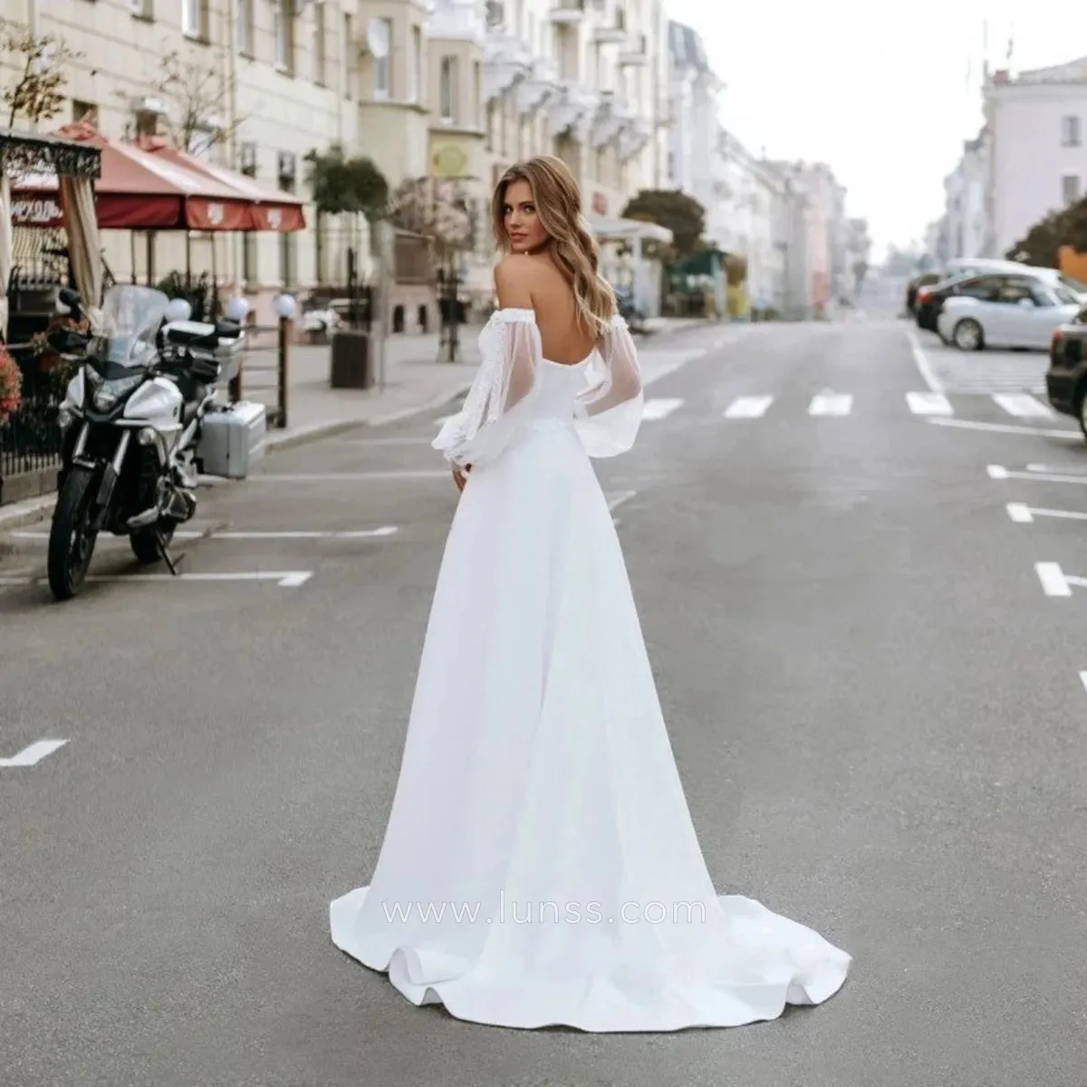simple ivory satin a line long puff sleeves wedding dress with a zipper back and sweep train