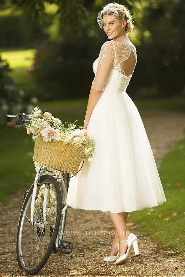 beaded illusion tea length bridal dress beaded illusion tea length bridal dress