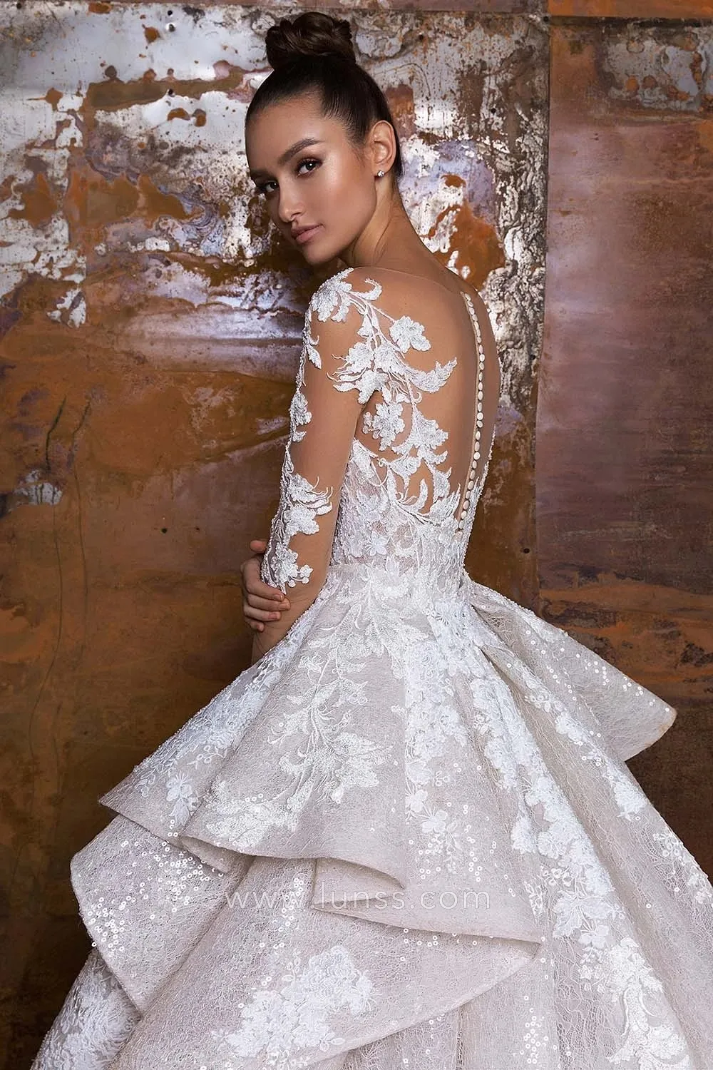 lace wedding dress with heavy removable layered overskirt