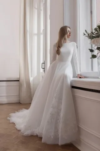 elegant boat neck long sleeve crepe and tulle bridal gown
