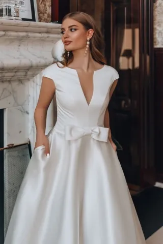 elegant off white satin cap sleeve v neck wedding gown
