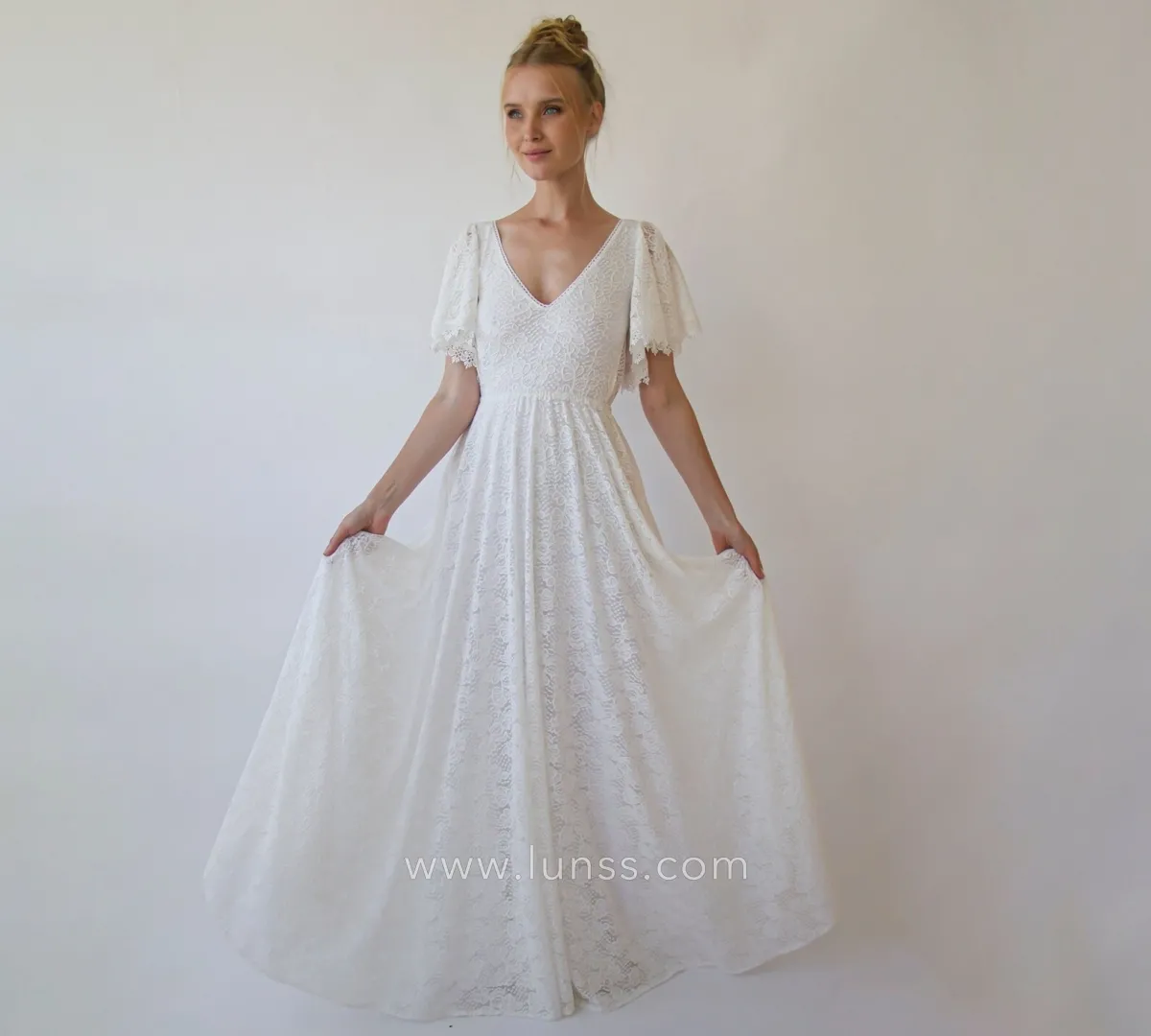 ivory lace flutter sleeve bridal dress