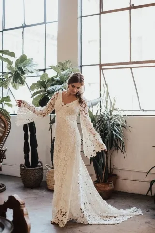 ivory lace winter boho wedding dress with bell sleeves