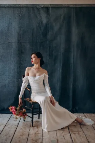 off the shoulder cowl neck long sleeve satin bridal dress