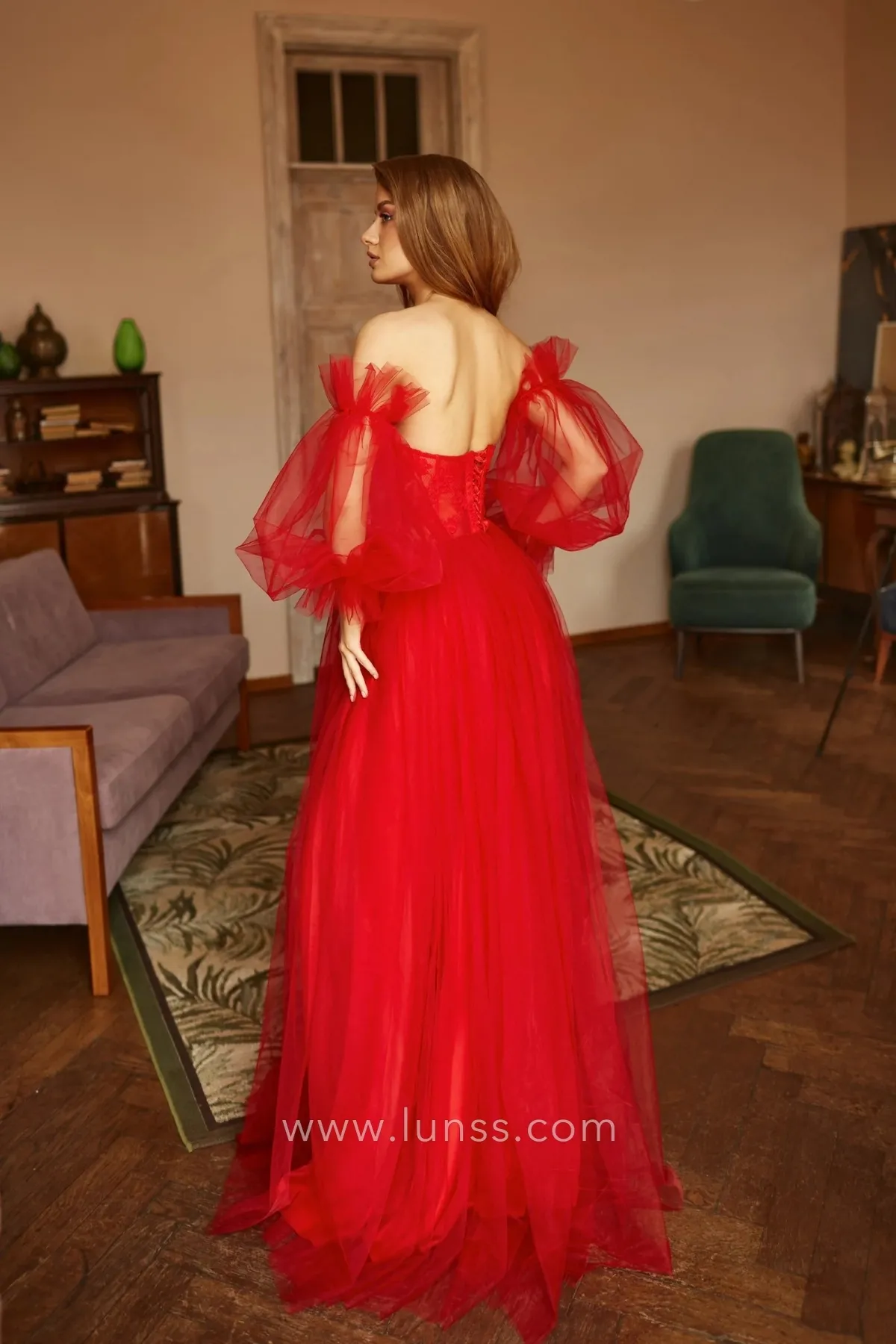 red tulle photoshoot dress with puff sleeves