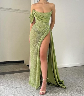 asymmetrical green beading corset split prom dress