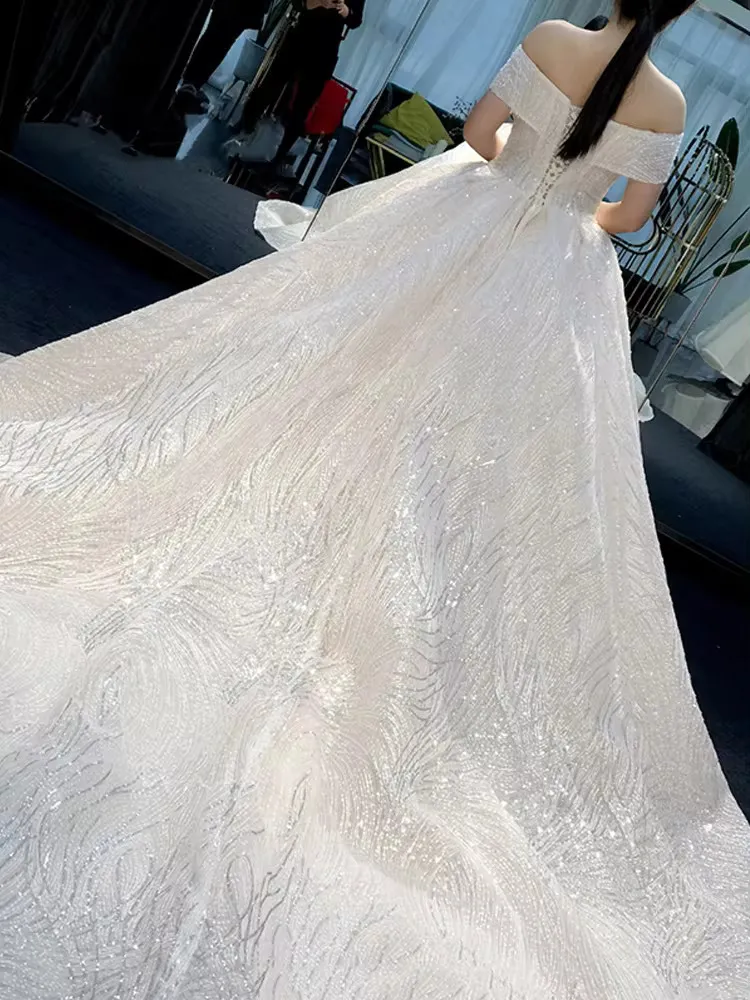 luxury sequinned mesh wedding ball gown with lace up back