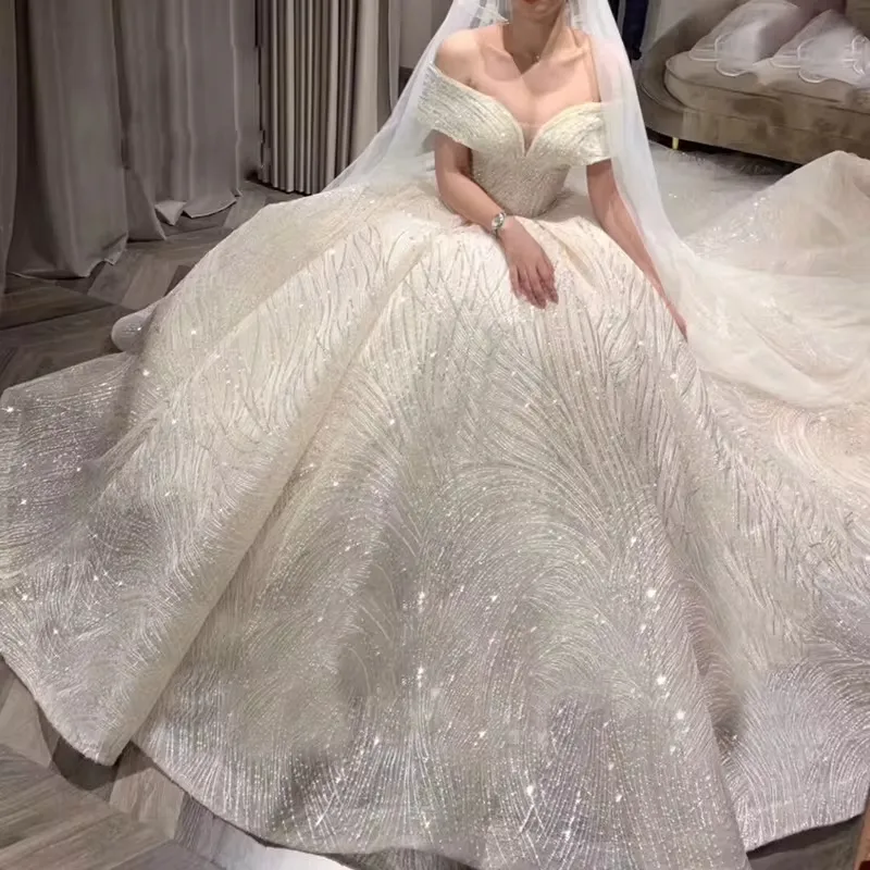 off shoulder sparkly wave sequinned lace wedding dress