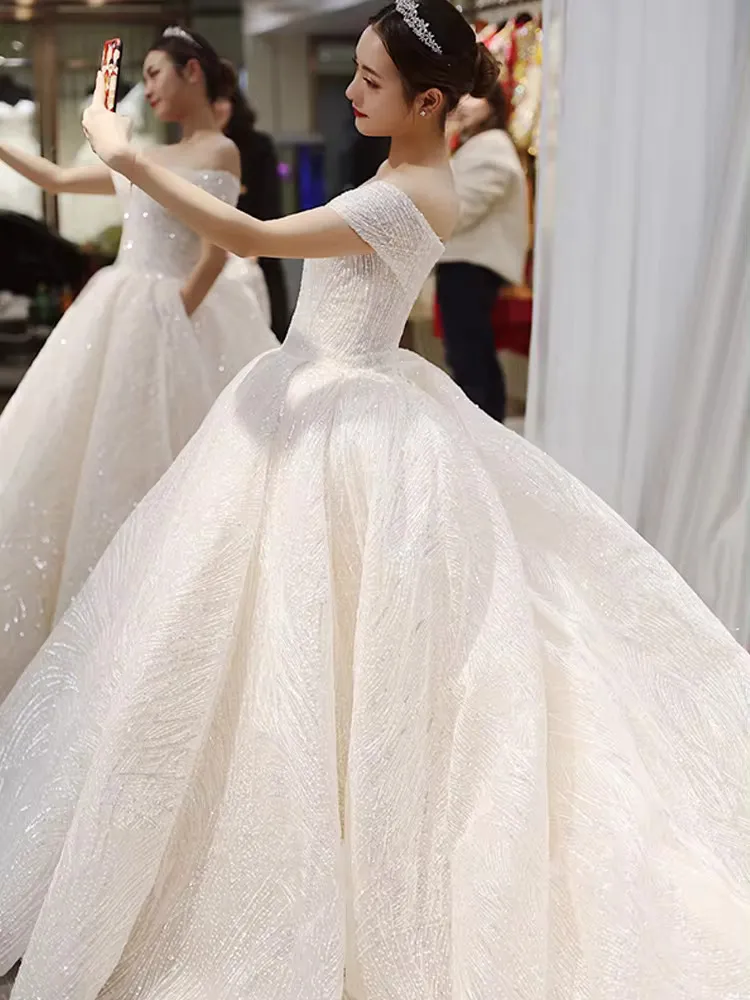 sparkly off the shoulder wedding ball gown