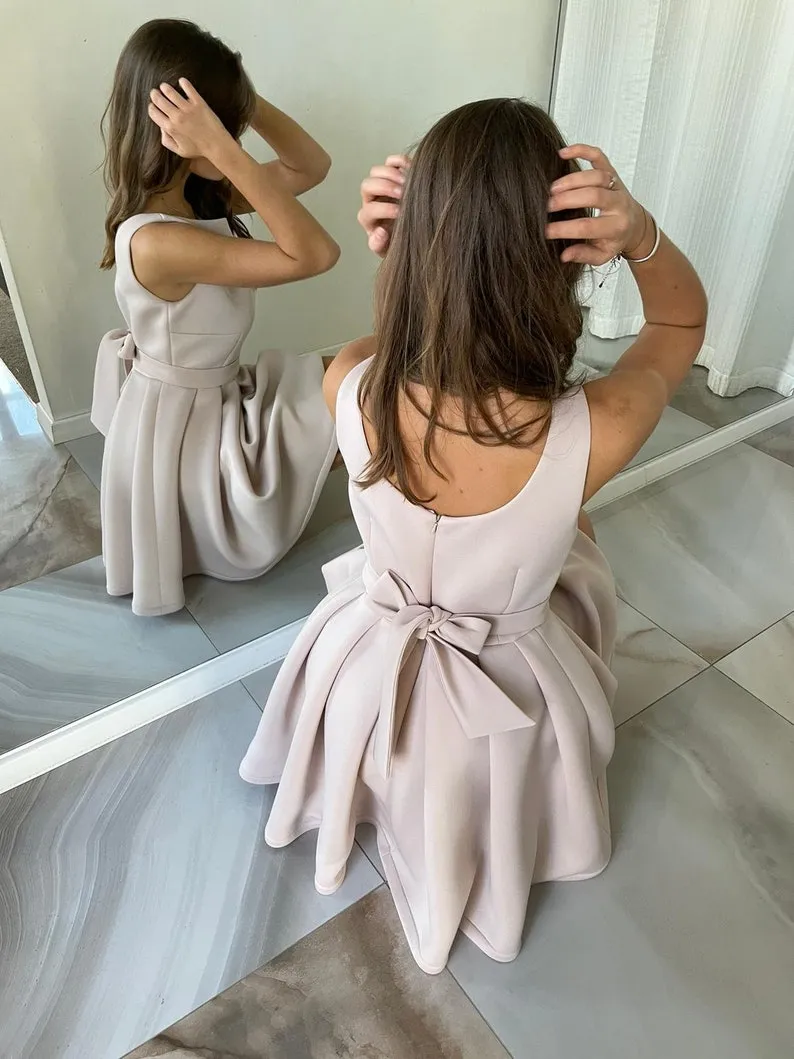 modern satin cocktail dress with bow tie