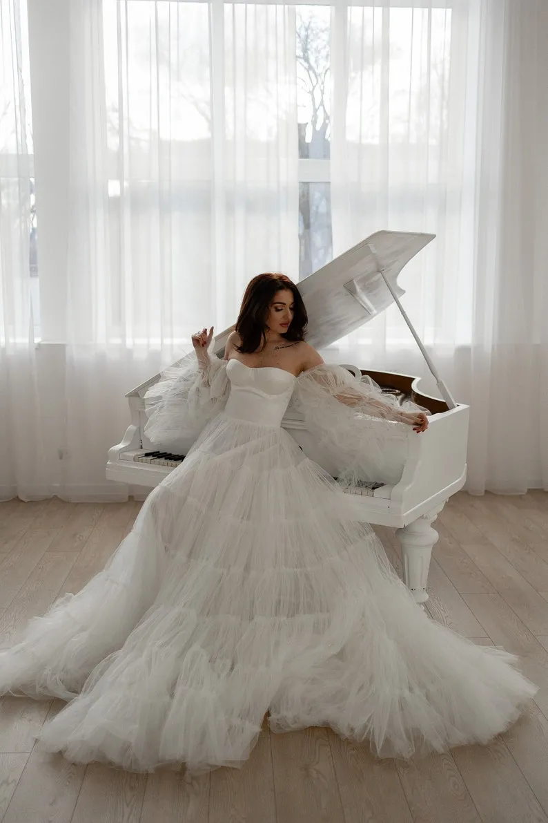 voluminous sheer sleeves ivory tulle tiered wedding dress