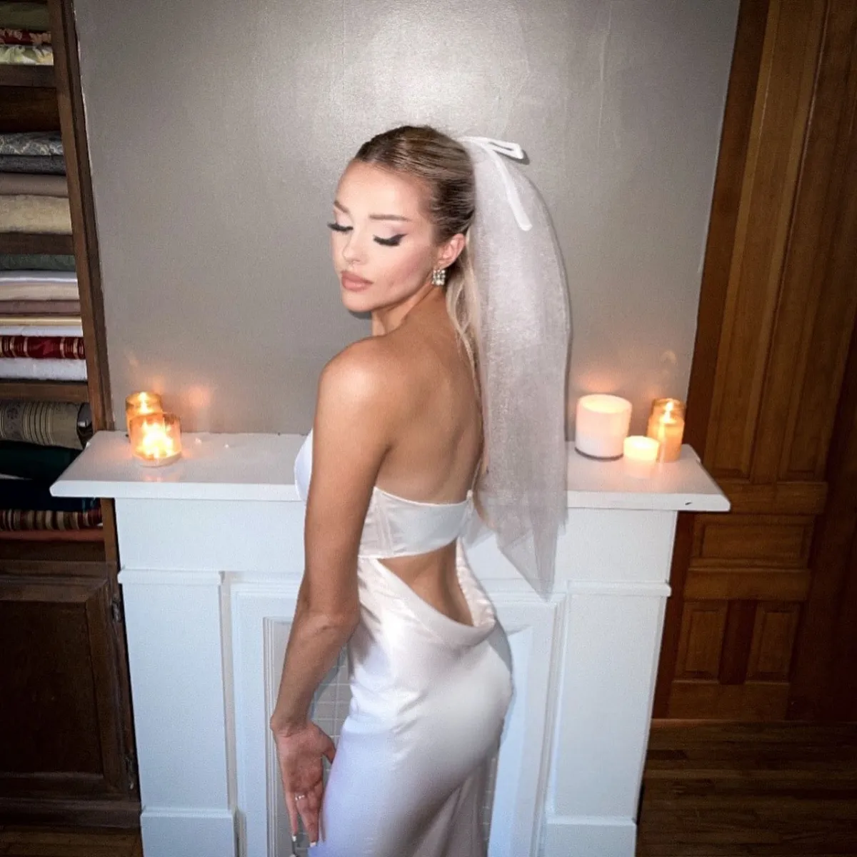 Ariana Grande sculpted neckline satin low back bridal dress
