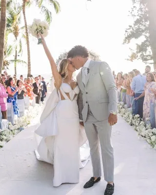 Brittany Mahomes beaded strap cutout wedding dress