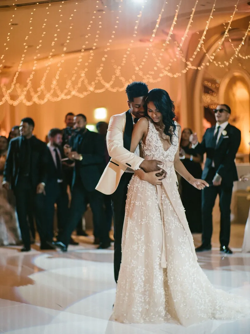 Chanel Iman plunging neck floral lace wedding dress Chanel Iman plunging neck floral lace wedding dress