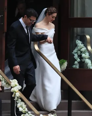 Emmy Rossum off shoulder folded satin sheath wedding gown