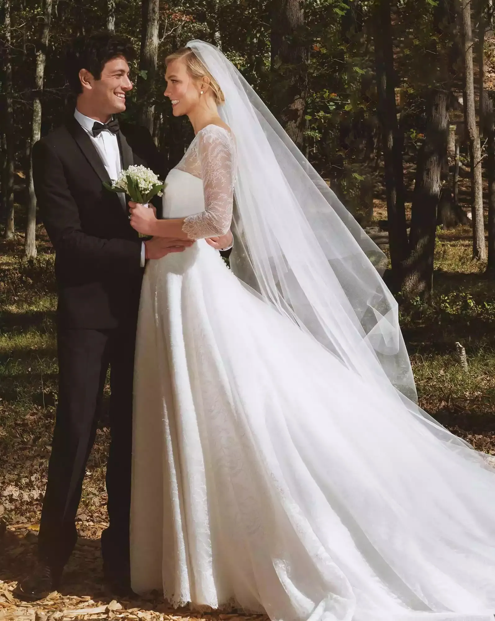 Karlie Kloss sheer lace 3 4 sleeve puffy wedding dress