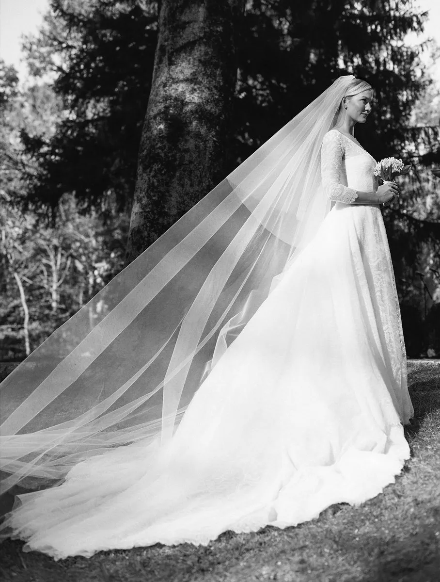 Karlie Kloss sheer lace puffy outdoor wedding dress with chapel train
