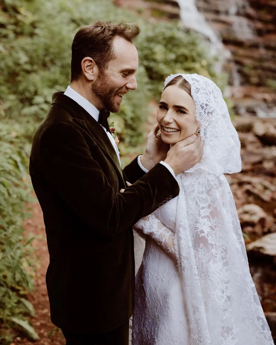 Lily Collins lace bridal dress with hooded cape Lily Collins lace bridal dress with hooded cape