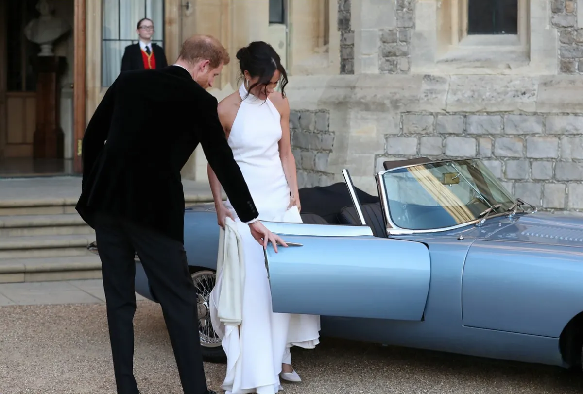 Meghan Markle halter white fit and flare reception dress Meghan Markle halter white fit and flare reception dress