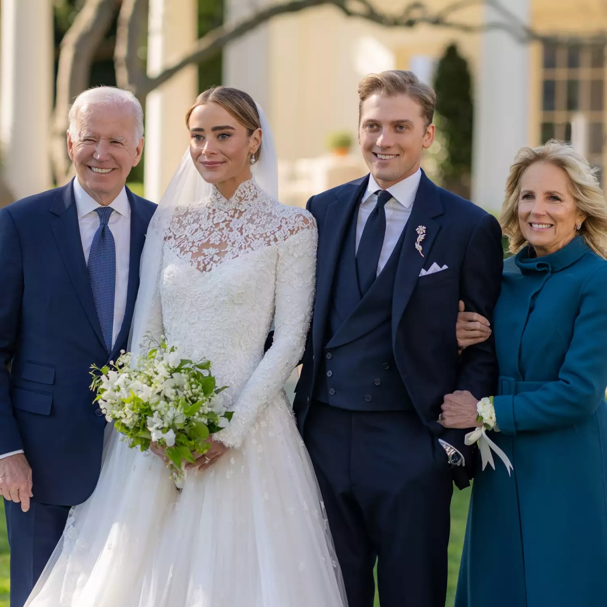 Naomi Biden illusion high neck ivory lace wedding dress Naomi Biden illusion high neck ivory lace wedding dress