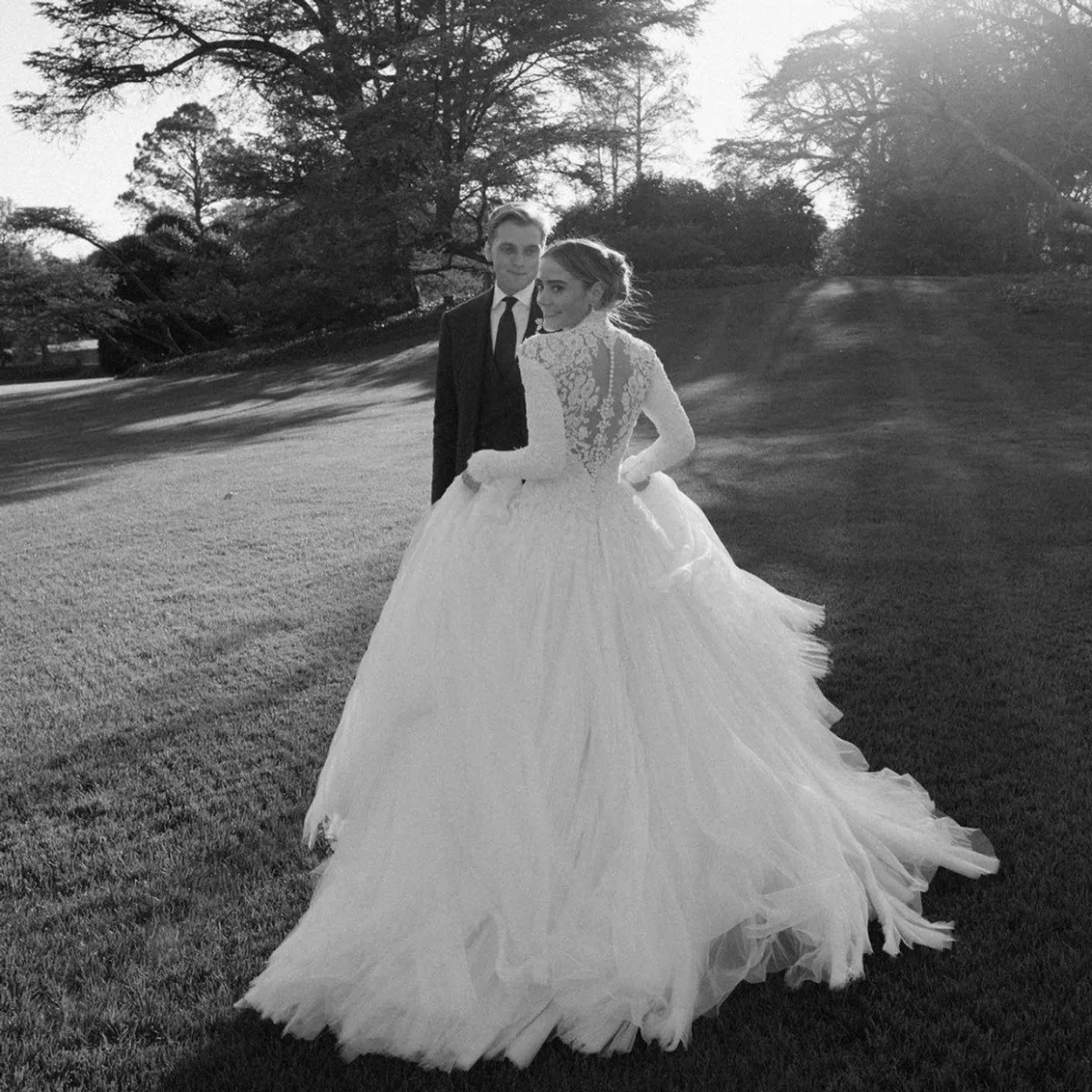Naomi Biden illusion lace back puffy wedding dress Naomi Biden illusion lace back puffy wedding dress