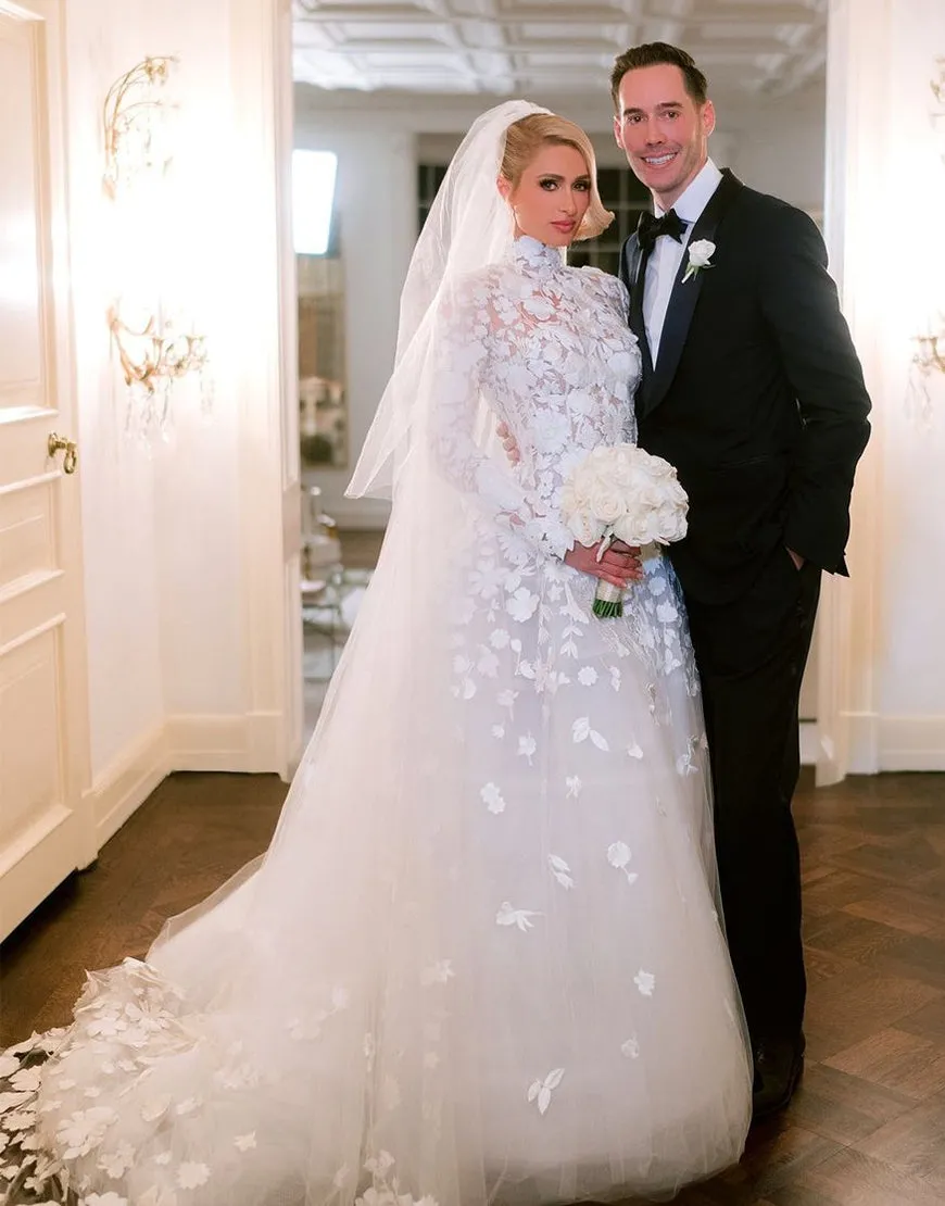 Paris Hilton 3d floral lace high neck long sleeve wedding gown Paris Hilton 3d floral lace high neck long sleeve wedding gown