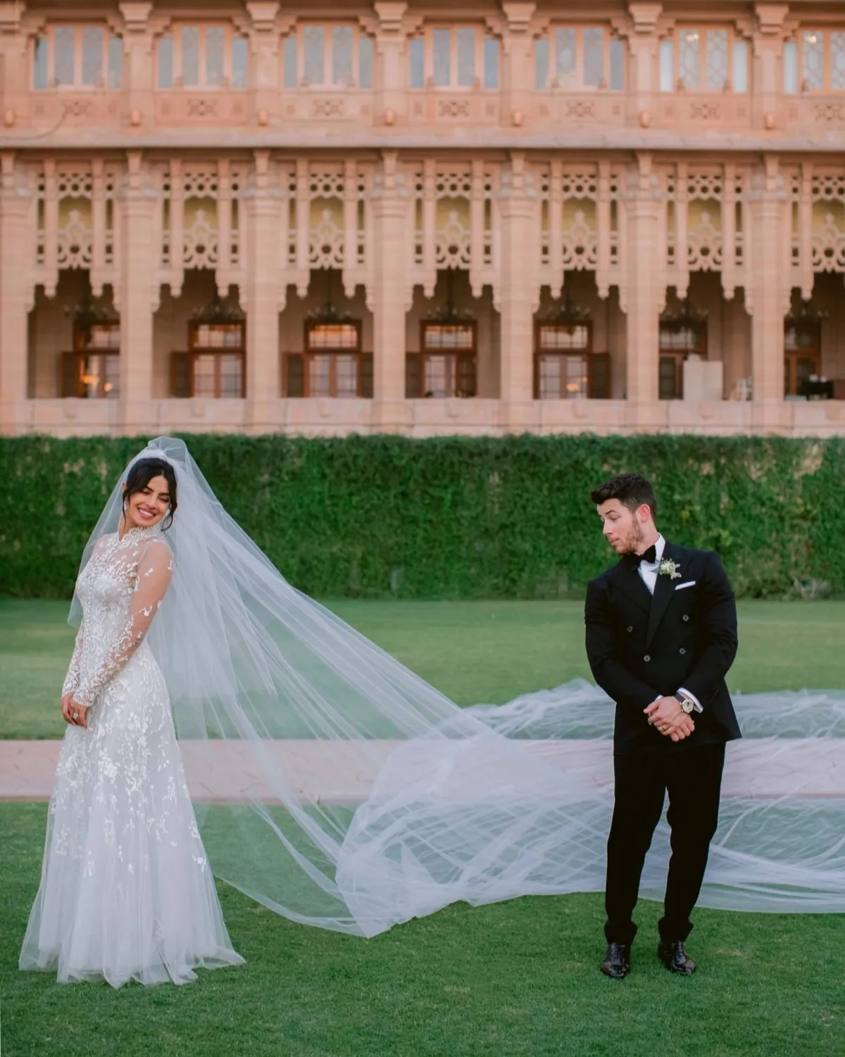 Priyanka Chopra high neck illusion lace A line bridal dress