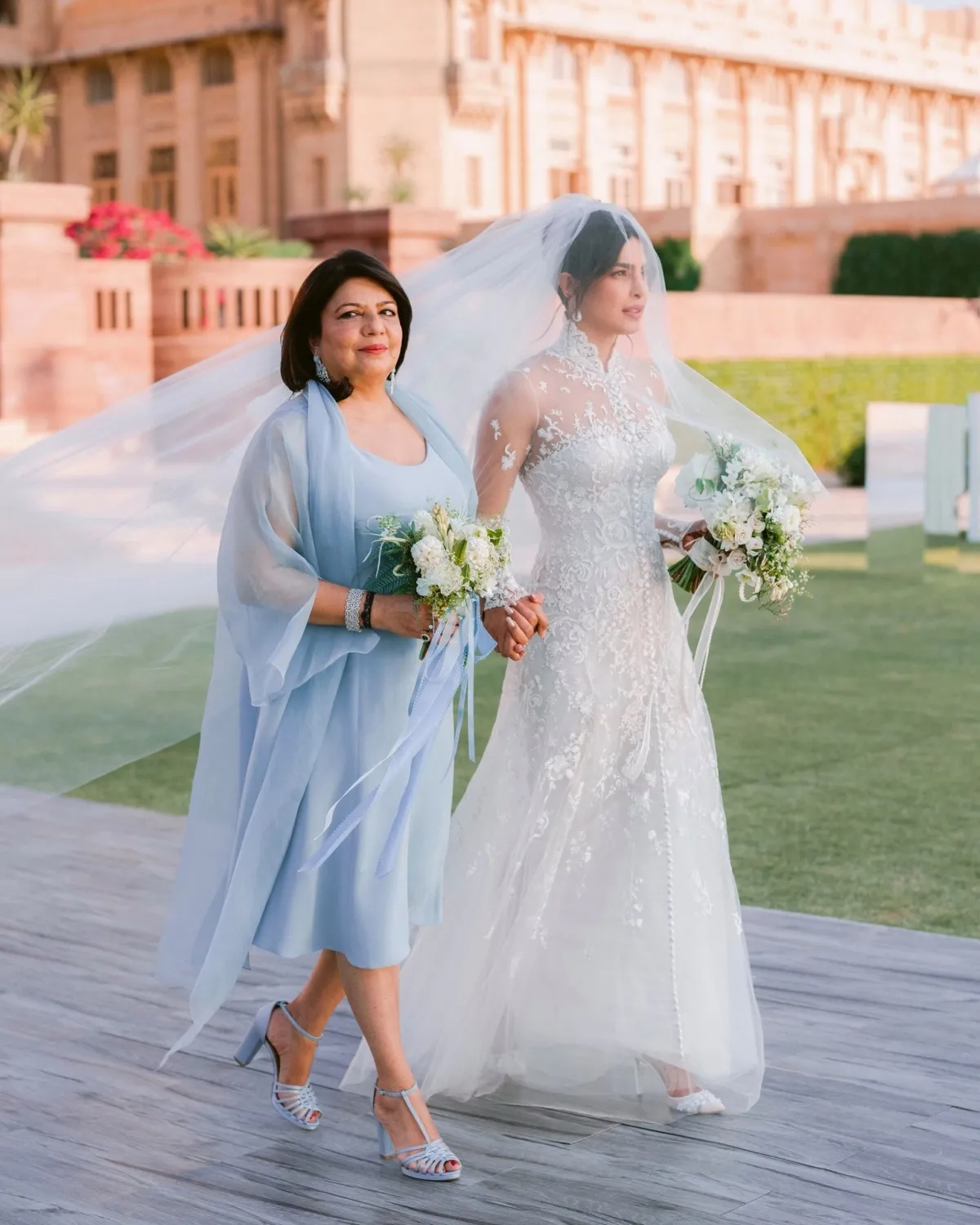 Priyanka Chopra high neck illusion lace wedding dress with tulle veil