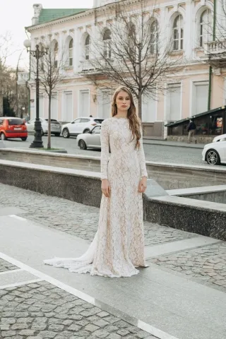 elegant ivory lace nude lining fit and flare wedding gown