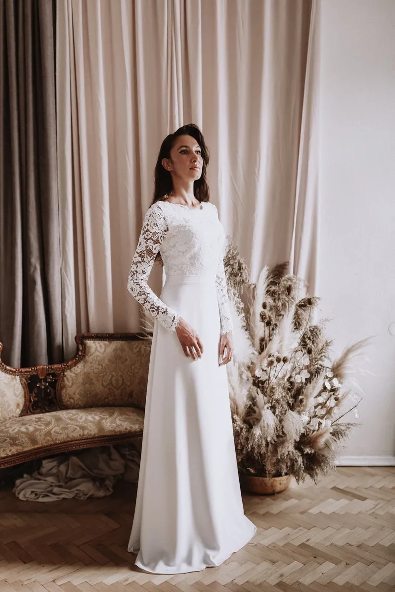 modest white lace and crepe long sleeve wedding dress