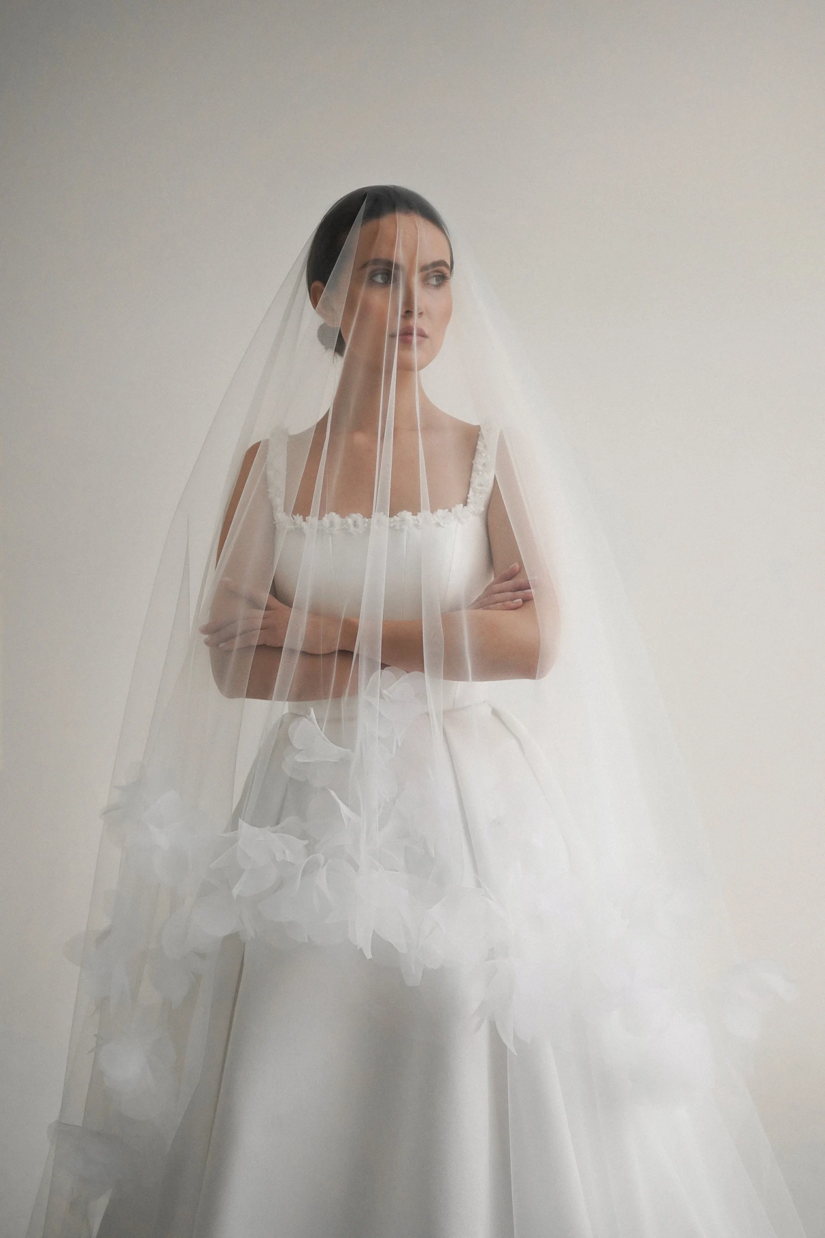 ivory satin wedding dress with bridal veil
