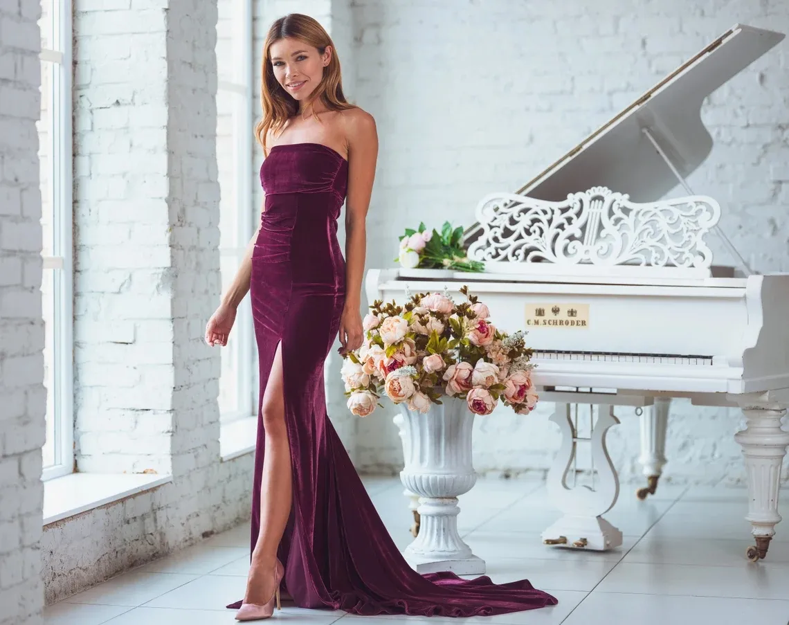 plum velvet strapless mermaid slit wedding guest dress